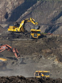 photography of excavators at mining area